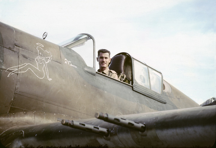 Robert T. Smith in the cockpit of P-40 Tomahawk #77 - Nov. 23, 1
